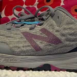 New Balance Nitrel V3 trail running shoe in grey with purple "N" logo